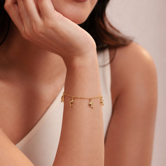 Dancing Dolphins Charm Bracelet Gold