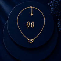 The Cupid Nail Pendant & Earring Set Gold